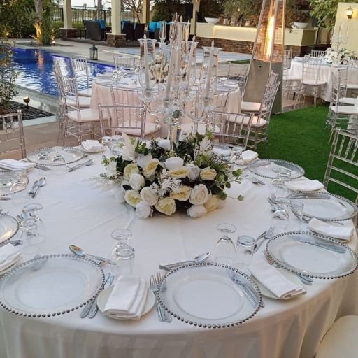 round table with white cover dubai & across UAE